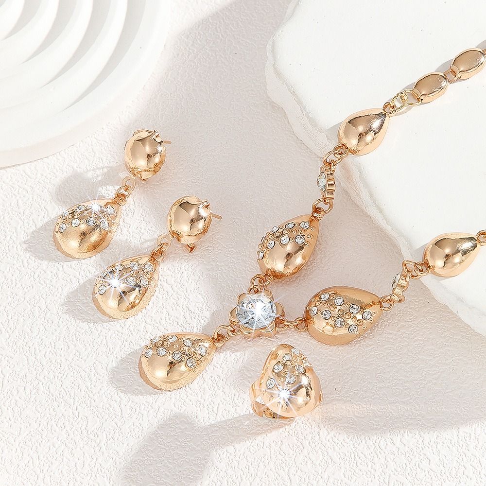 Hot Gold Zinc Alloy Inlaid 2025 Africa Europe America White Rhinestone Metal 8-figure Necklace Earrings Rhinestone Metal Ieopard Head Necklace Earrings Water Drop Necklace Earrings Set Women's Jewelry