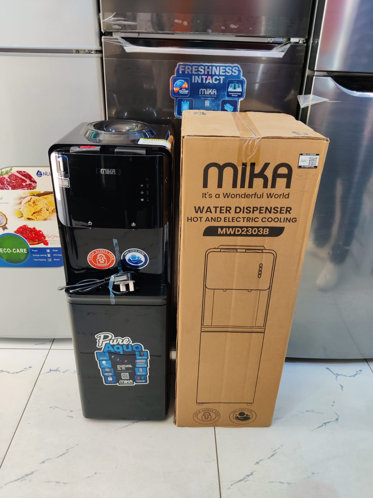 Mika Dispenser Hot and Cold with child safety lock Model:2303B.High-efficiency compressor cooling system for chilled water.Fast-heating system for hot water (ideal for tea, coffee, and instant meals).