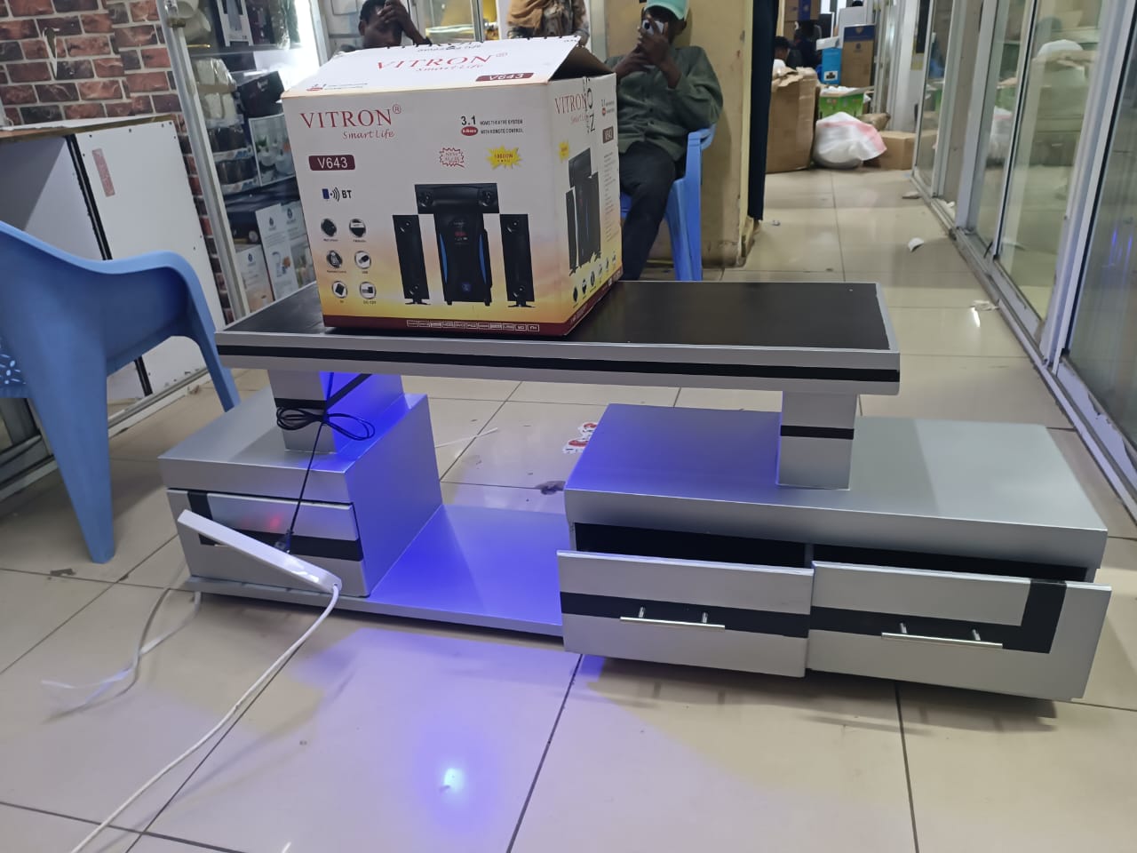 PROMOTION PRICE !!CLASSY TV STAND WITH LED FITTED LIGHTS SUPPORT UPTO 50 INCH SIZE TV. DRAWERS.An elegant Modern Tv stand.  its beautiful look and innovative colors, which highlight the beauty TABLE.