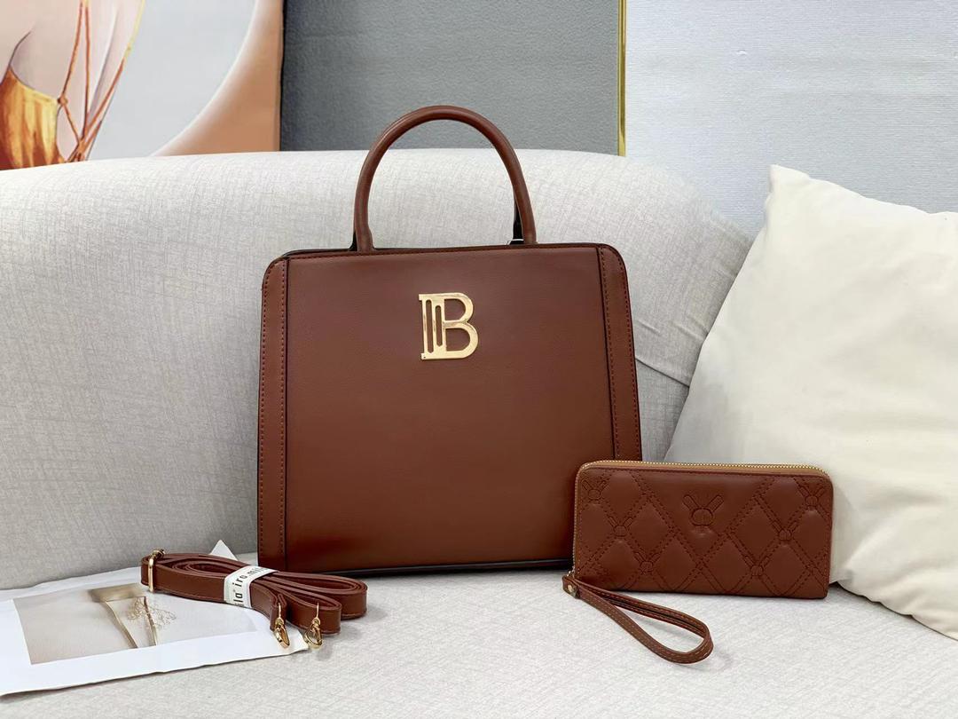 2 in 1 leather handbag.Crafted for elegance and functionality, these premium leather handbags are a must-have for the modern, stylish individual. Each bag comes with a matching wallet.