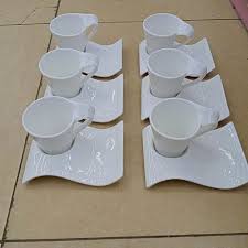 6 Pc Stylish Ceramic White Cups & Saucers Set – Elegant Wave Design, Premium Quality, Luxurious Feel, Perfect for Serving, Limited Stock – Upgrade Your Kitchen Today!