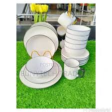 12 Piece Black Rimmed Ceramic Dining Set – Limited Stock! Elevate your dining experience with stylish 8” plates & cups – perfect for family meals & elegant hosting.