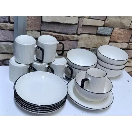 12 Piece Black Rimmed Ceramic Dining Set – Limited Stock! Elevate your dining experience with stylish 8” plates & cups – perfect for family meals & elegant hosting.