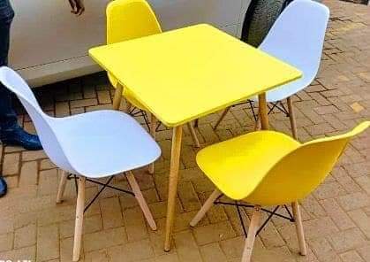 Two seater minimalist modern dining. Two strong chairs enhanced with metal rods One table size 60×60×70cm Metal stands