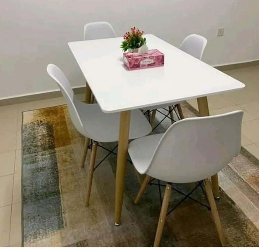 Two seater minimalist modern dining. Two strong chairs enhanced with metal rods One table size 60×60×70cm Metal stands