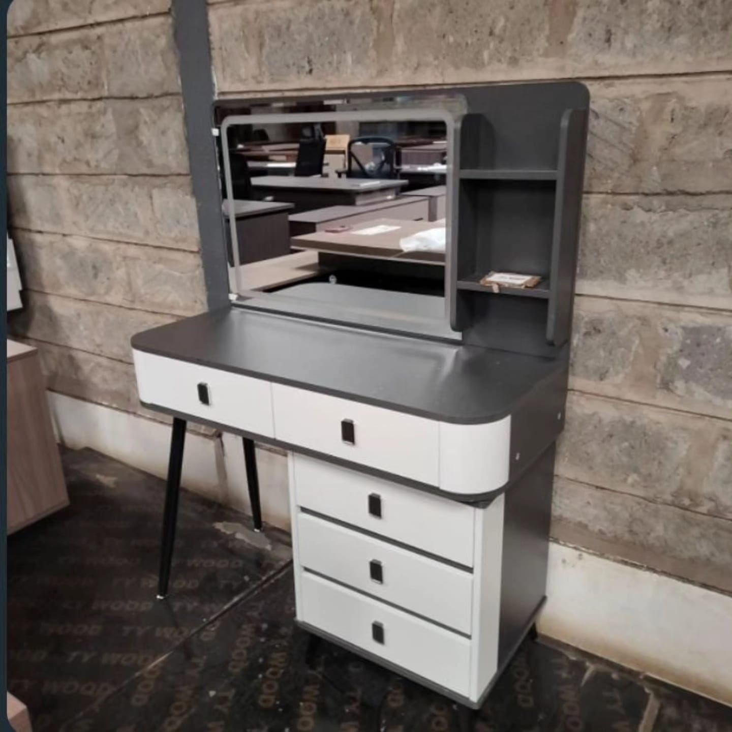 Dressing table with sliding mirror; made from high quality woods and finished with three layers of paint, this vanity table will stand the test of time