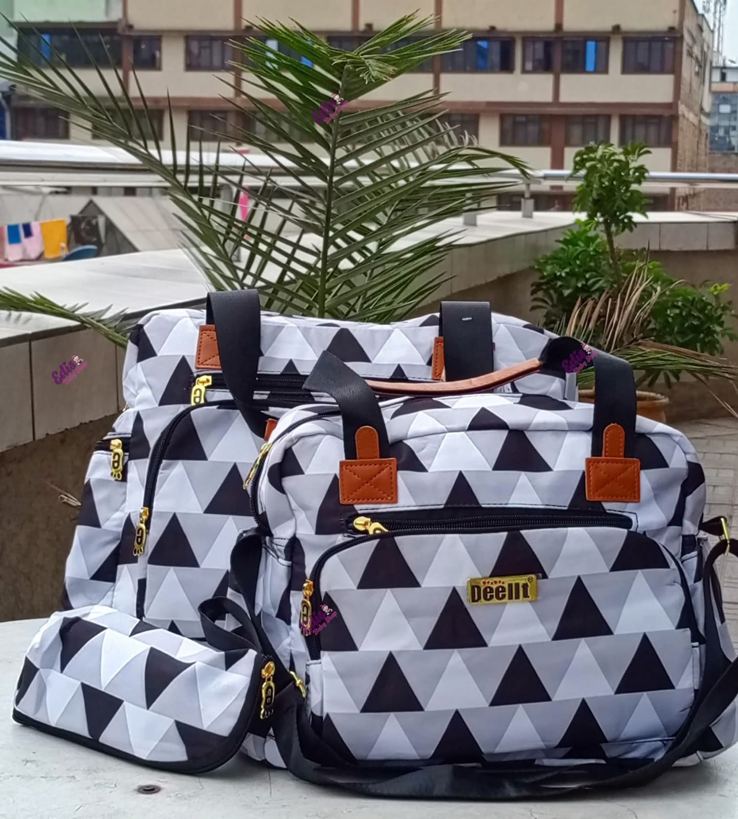 4-in-1 Geometric Diaper Bag Set,large main diaper bag, a medium-sized bag, a matching bottle holder and a waterproof changing mat.organized and stylish with this 4-piece diaper bag set