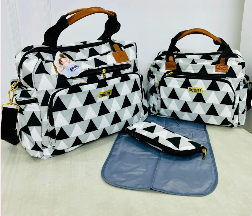 4-in-1 Geometric Diaper Bag Set,large main diaper bag, a medium-sized bag, a matching bottle holder and a waterproof changing mat.organized and stylish with this 4-piece diaper bag set