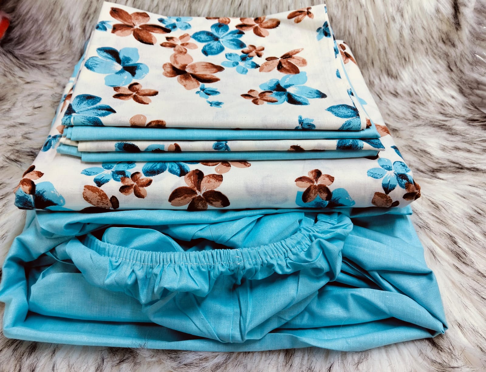 Mix and match bedsheets;2 pcs bedsheets,1 fitted-Plain,1flat -pattern and 4 pcs pillow cases.Indulge in the sumptuous softness of our premium cotton fabric, renowned for its breathability, durability.
