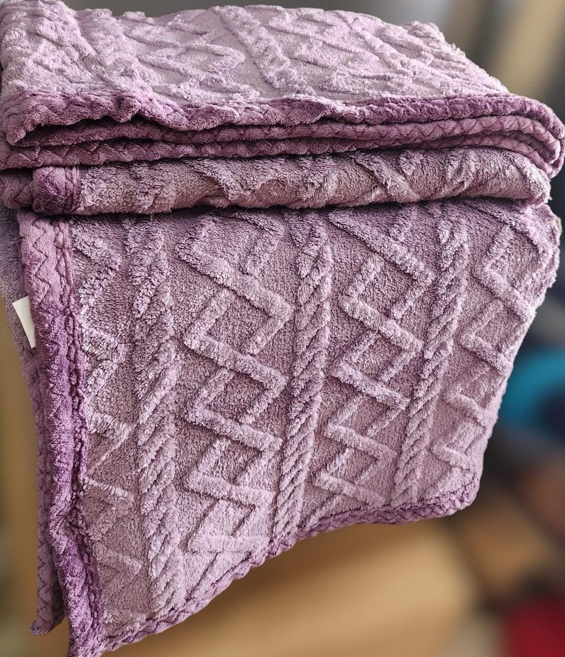 Cozy fleece woolen blanket. Crafted with high-quality, thickened fabric, this blanket provides exceptional insulation and plush comfort. Stay warm and cozy during chilly nights or relaxing moments.