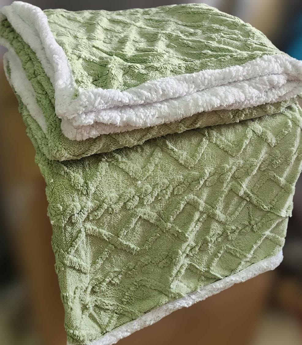 Cozy fleece woolen blanket. Crafted with high-quality, thickened fabric, this blanket provides exceptional insulation and plush comfort. Stay warm and cozy during chilly nights or relaxing moments.