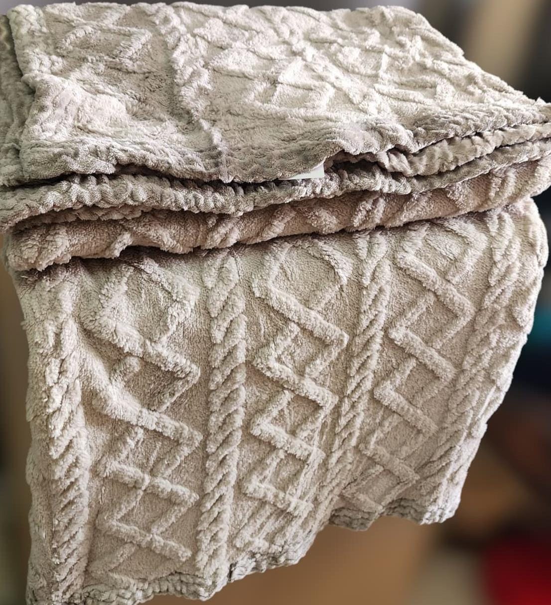 Cozy fleece woolen blanket. Crafted with high-quality, thickened fabric, this blanket provides exceptional insulation and plush comfort. Stay warm and cozy during chilly nights or relaxing moments.