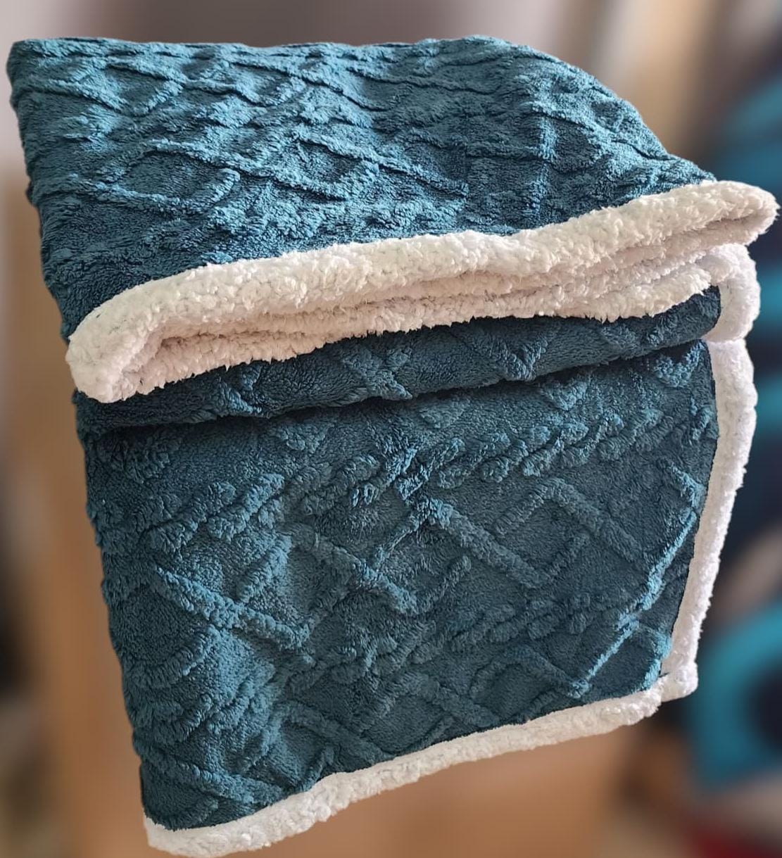 Cozy fleece woolen blanket. Crafted with high-quality, thickened fabric, this blanket provides exceptional insulation and plush comfort. Stay warm and cozy during chilly nights or relaxing moments.
