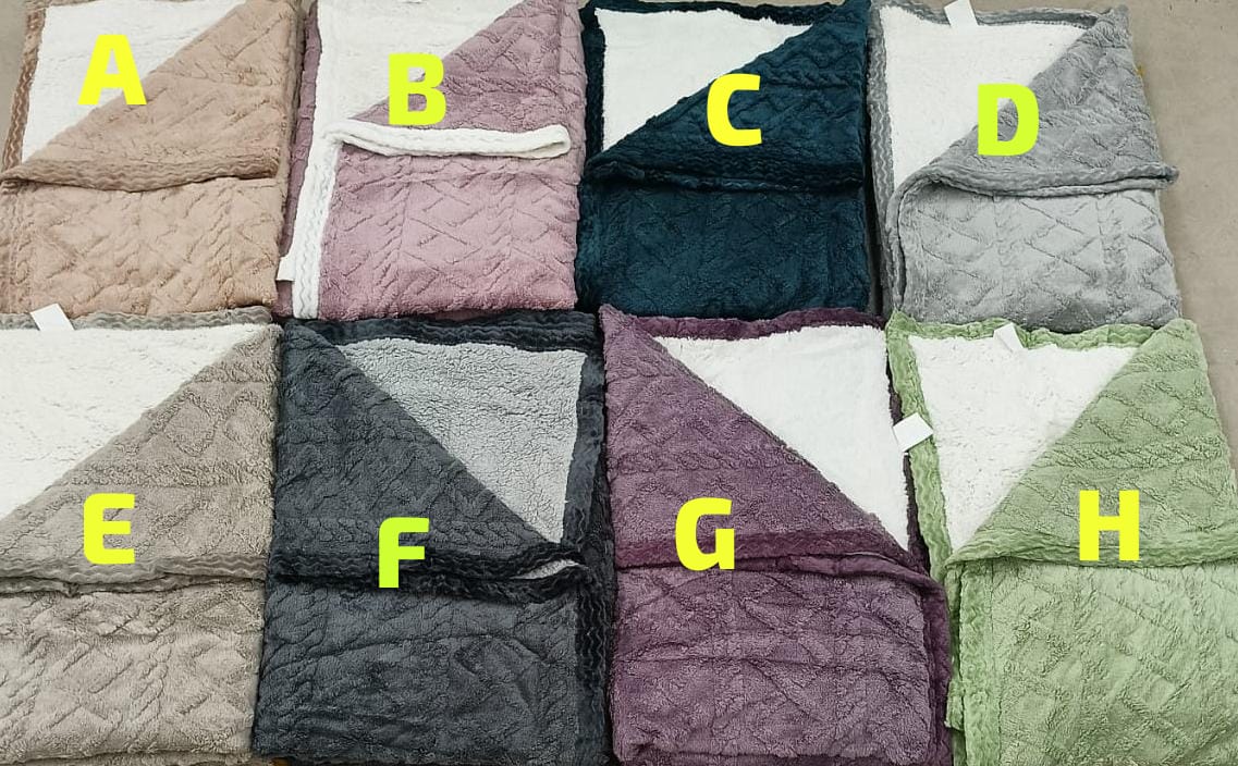 Cozy fleece woolen blanket. Crafted with high-quality, thickened fabric, this blanket provides exceptional insulation and plush comfort. Stay warm and cozy during chilly nights or relaxing moments.