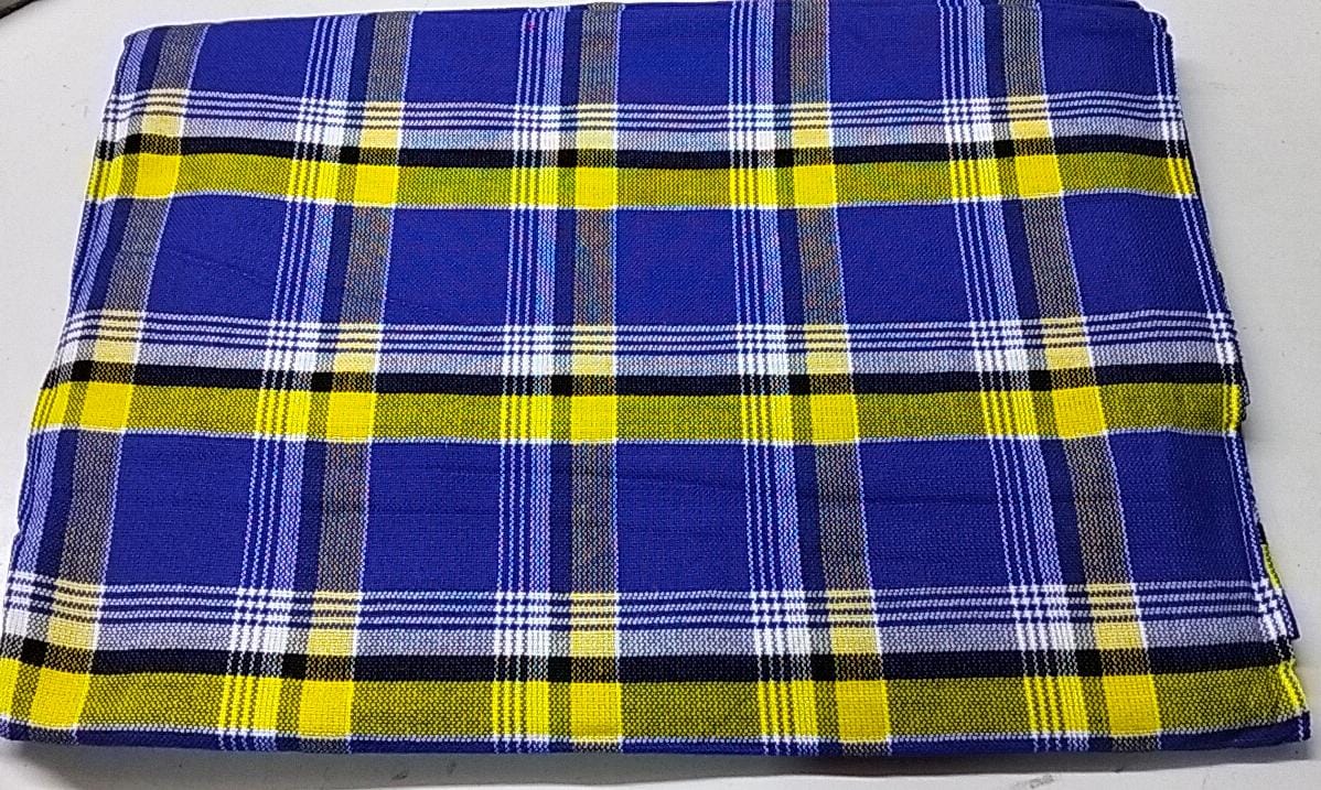 Masai Shuka.Crafted from high-quality cotton or acrylic blends, this blanket is designed to be both warm and breathable, making it ideal for outdoor adventures.