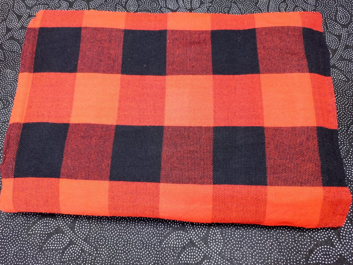 Masai Shuka.Crafted from high-quality cotton or acrylic blends, this blanket is designed to be both warm and breathable, making it ideal for outdoor adventures.