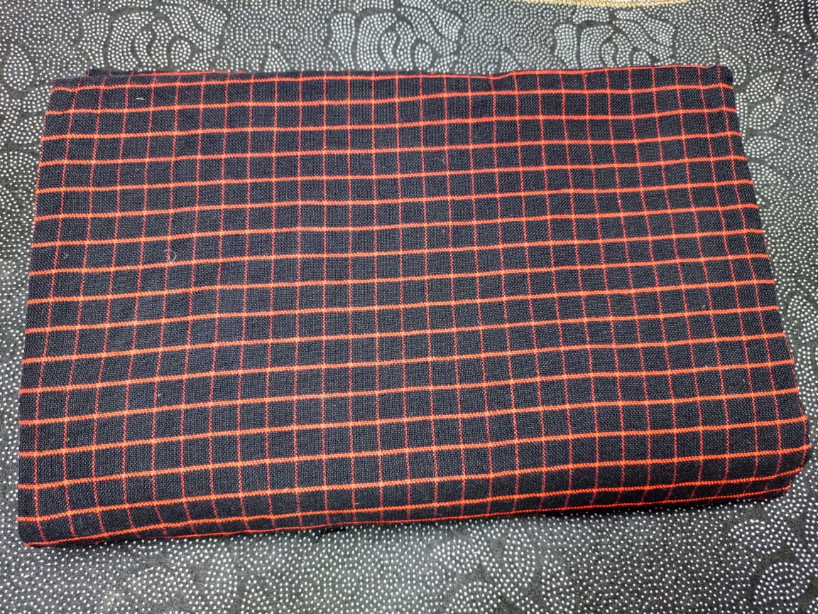 Masai Shuka.Crafted from high-quality cotton or acrylic blends, this blanket is designed to be both warm and breathable, making it ideal for outdoor adventures.