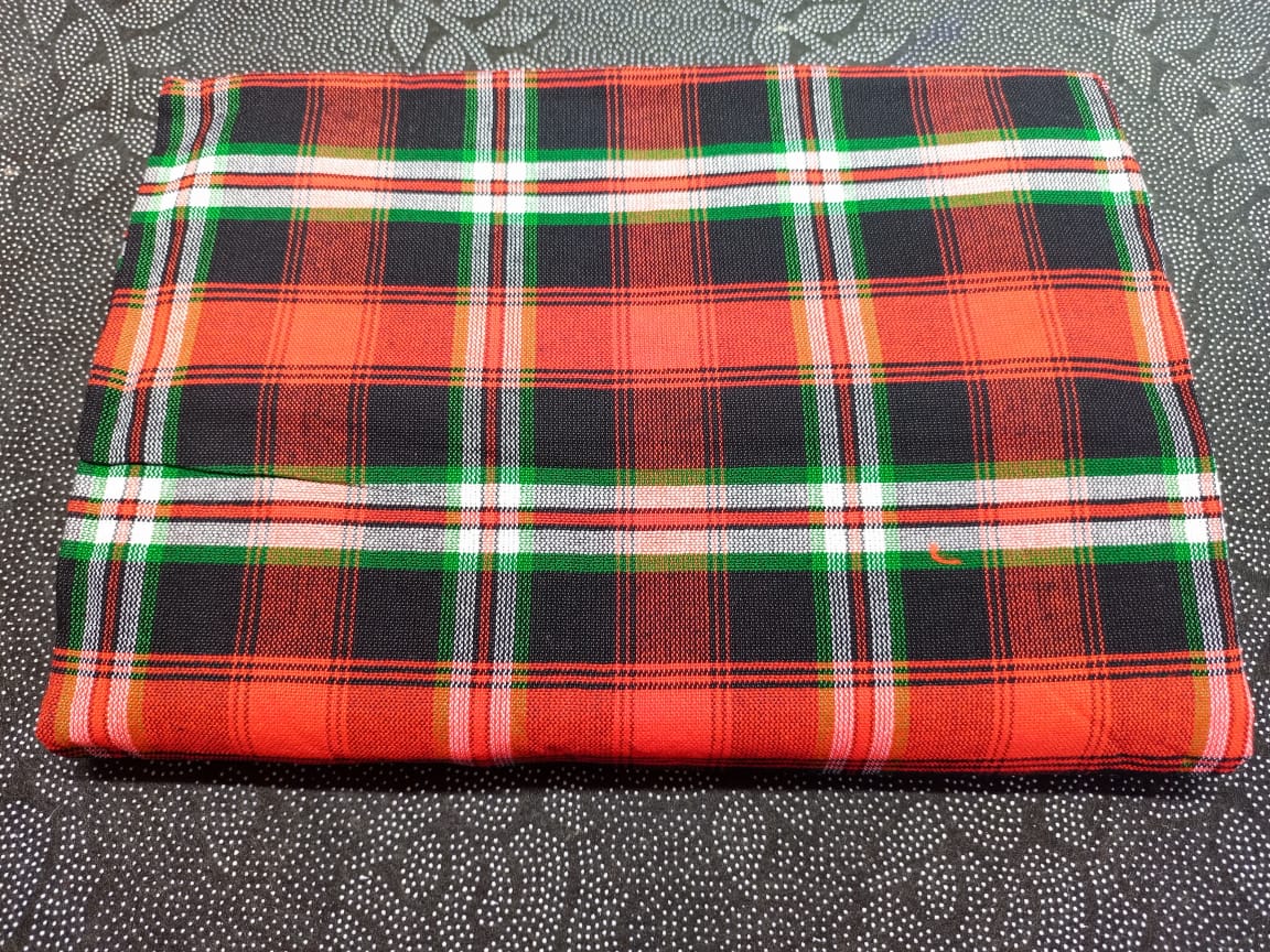 Masai Shuka.Crafted from high-quality cotton or acrylic blends, this blanket is designed to be both warm and breathable, making it ideal for outdoor adventures.