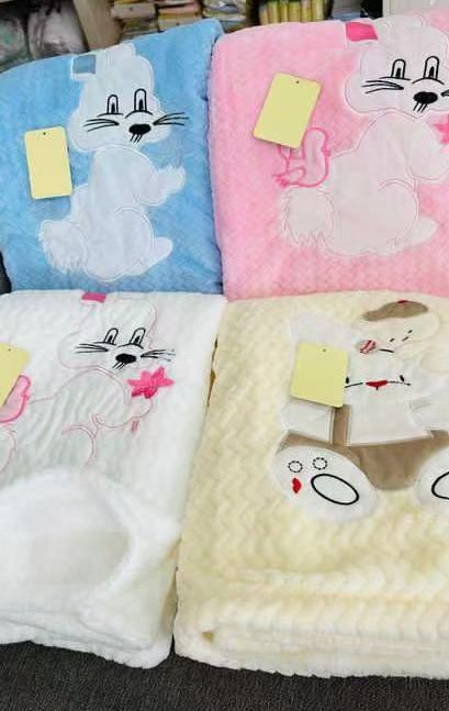 BABY SHAWLS. They are typically made from ultra-soft, warm fleece fabrics to provide comfort and warmth for newborns.