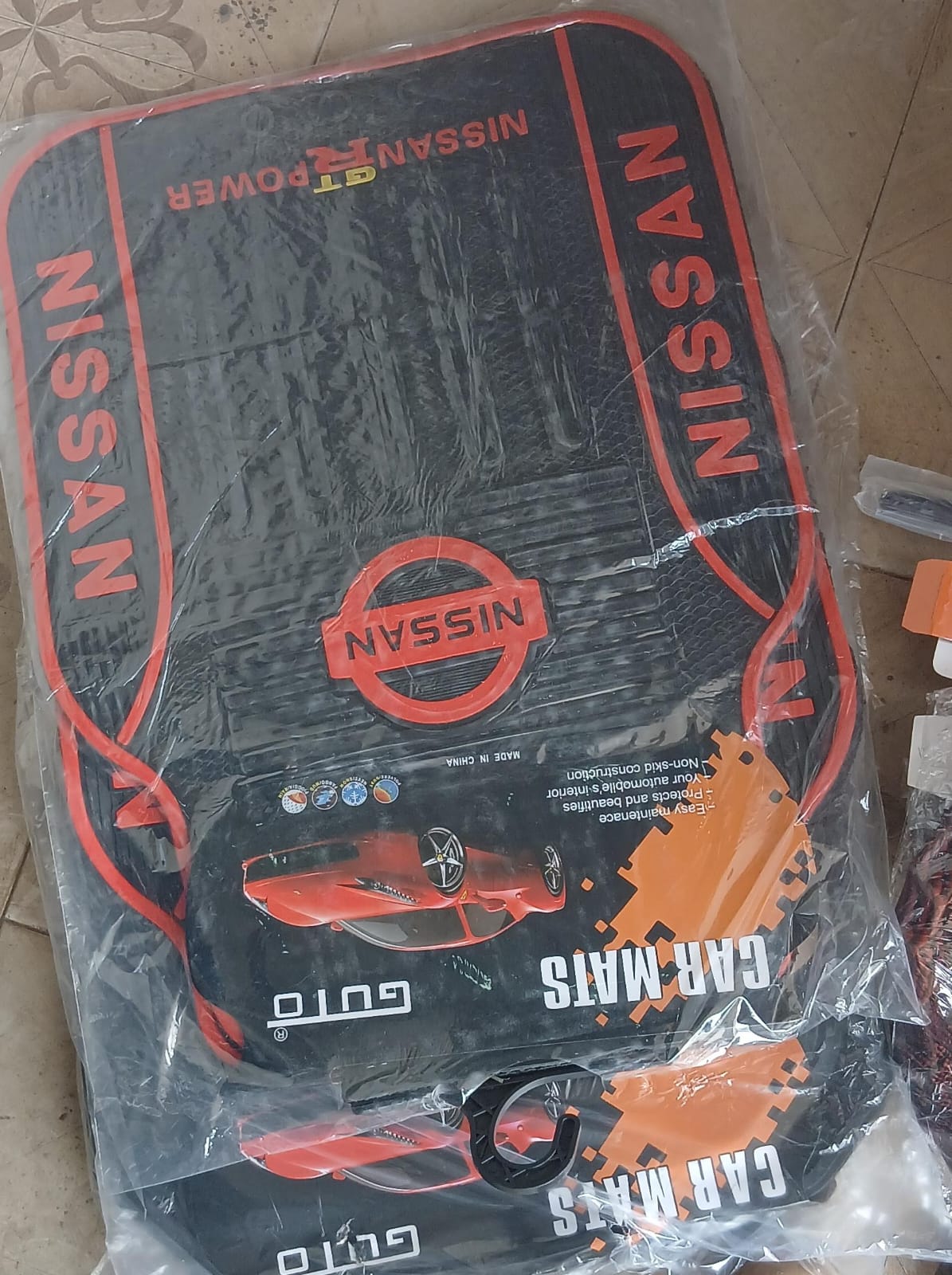 Nissan Heavy Duty Rubber Floor Mats 5pcs. Includes 2 pieces for the front seats and 3 pieces for the back seats, ensuring full coverage and protection for your car's entire flooring.