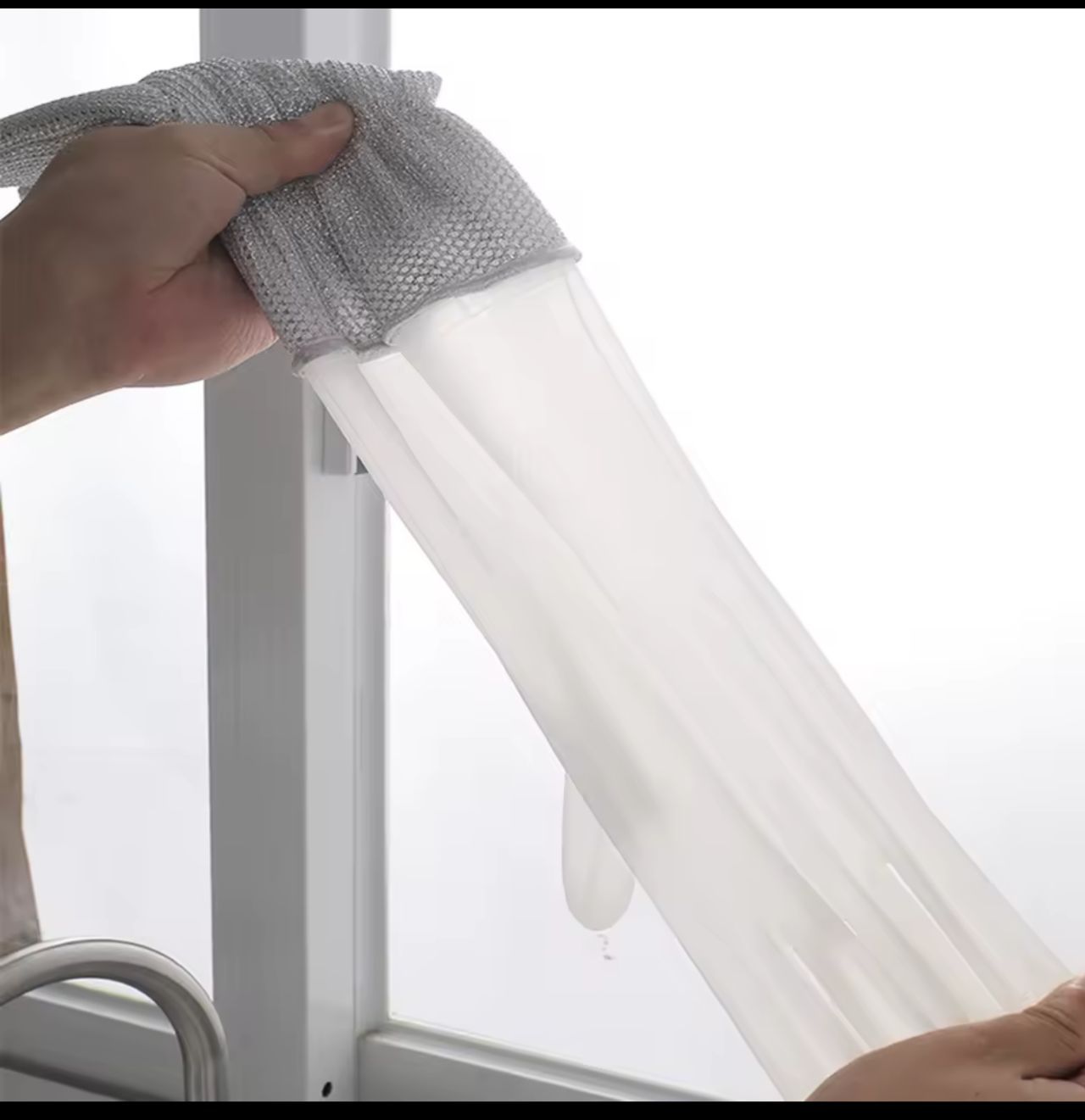 CLEANING GLOVES. A Pair of Magic Steel Wire Cleaning Gloves Household Dishwashing, Designed with a textured, non-slip grip and is durable enough to scrub dishes, pots, and pans without damaging hands.