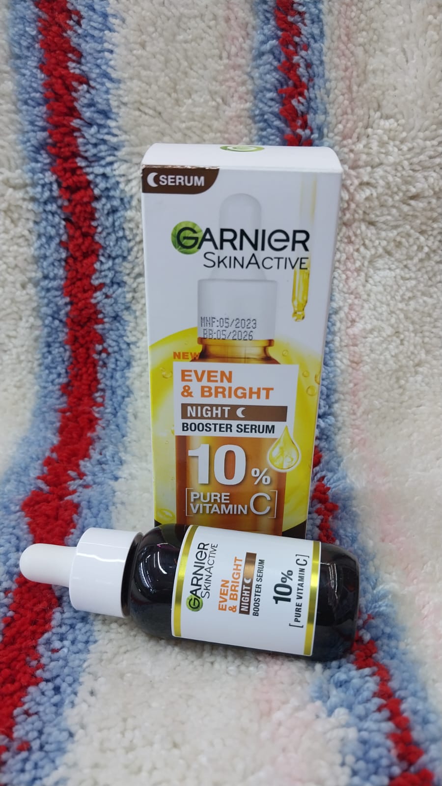 GARNIER EVEN AND BRIGHT BOOSTER SERUM mainly for transforming the body back to it's initial state