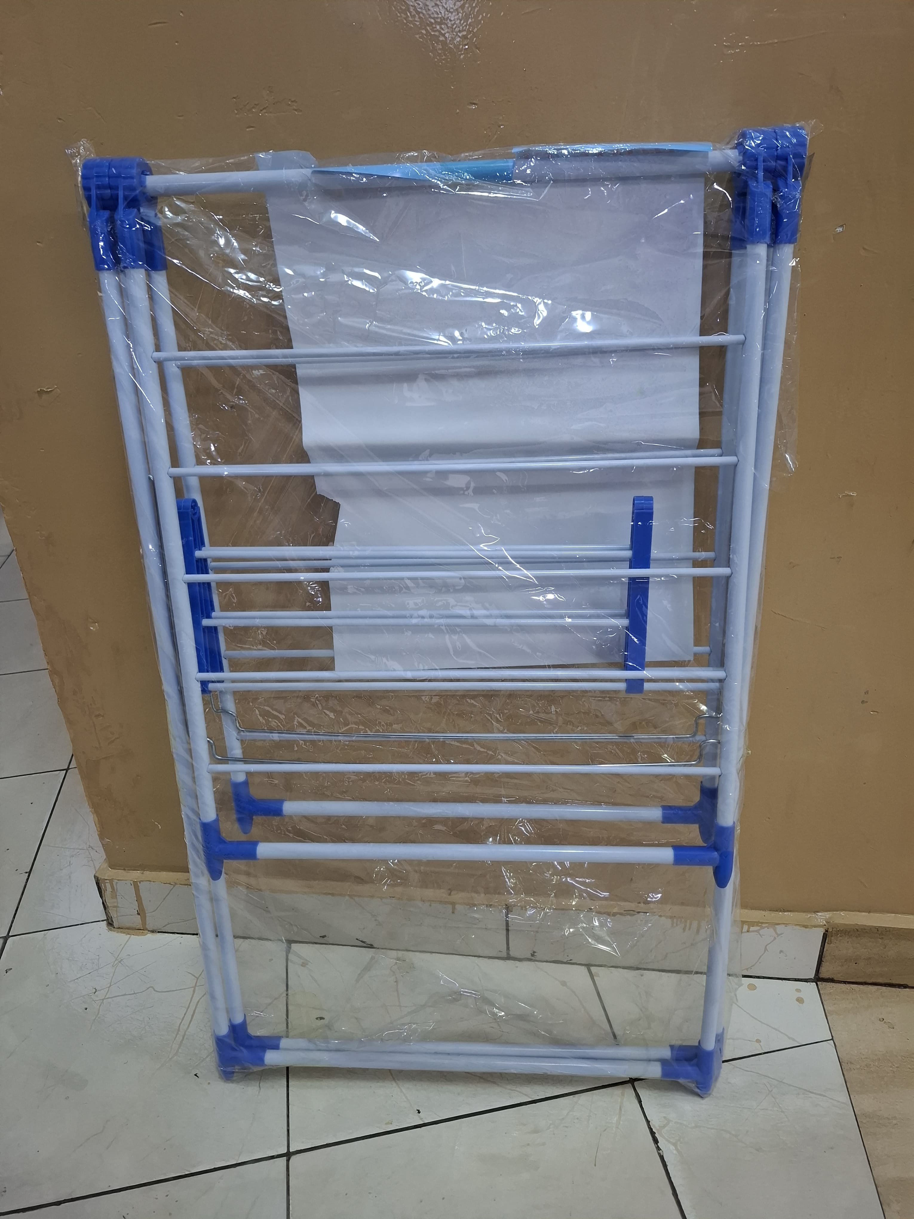 Plastic Drying Home clothes Stand Dimensions:1.2m (already assembled) for home, airbnbs, hotel use, portable hence easy to mo