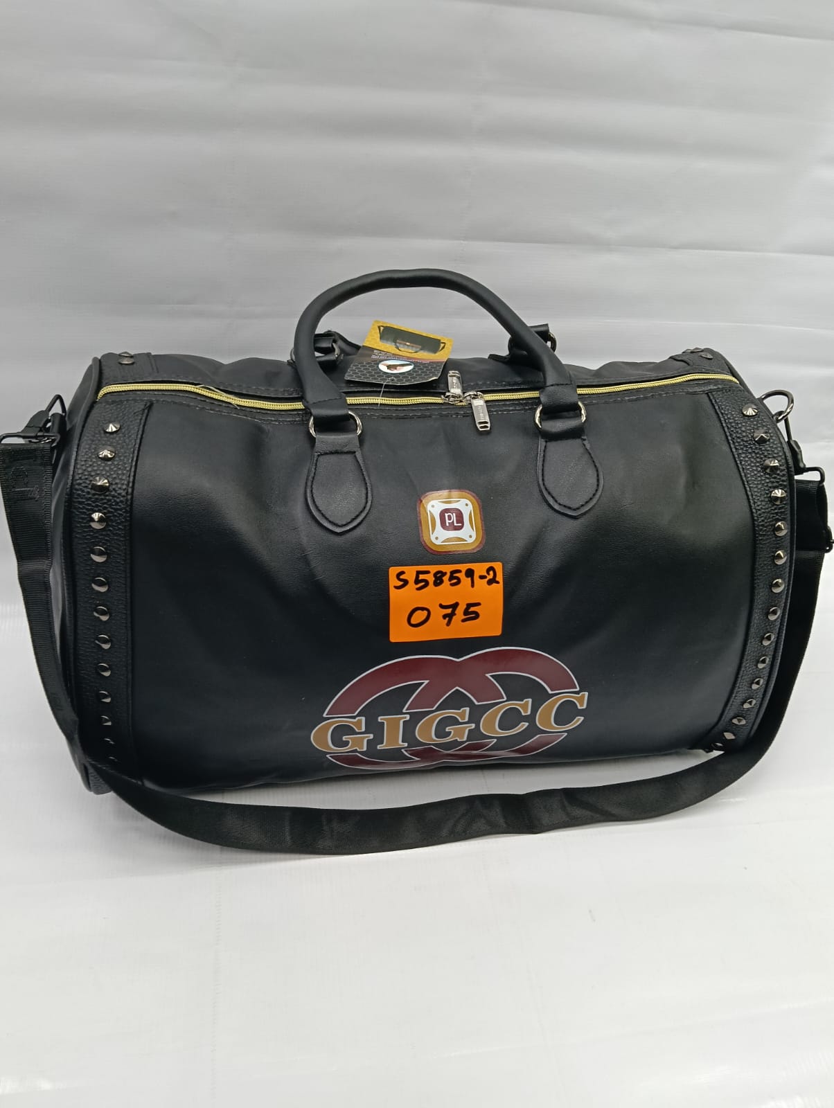 classic patent leather Large travel bag with silver spikes