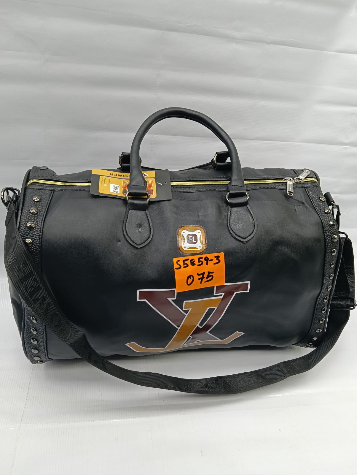 classic patent leather Large travel bag with silver spikes