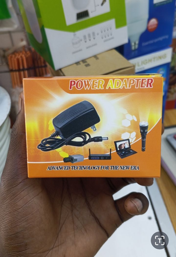 12V 2A Power Supply Adapter, also referred to as a charging adapter or plug-in transformer.