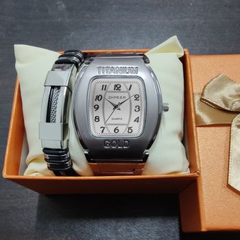 Men Quartz Wrist Watch Big Square Chronograph Titanium Gold For Business Leisure.The watch is constructed with a robust titanium alloy case and an alloy strap. The dial window is made of ordinaryglass