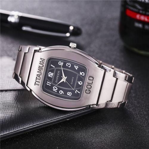 Men Quartz Wrist Watch Big Square Chronograph Titanium Gold For Business Leisure.The watch is constructed with a robust titanium alloy case and an alloy strap. The dial window is made of ordinaryglass