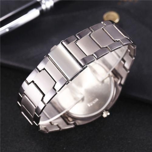 Men Quartz Wrist Watch Big Square Chronograph Titanium Gold For Business Leisure.The watch is constructed with a robust titanium alloy case and an alloy strap. The dial window is made of ordinaryglass