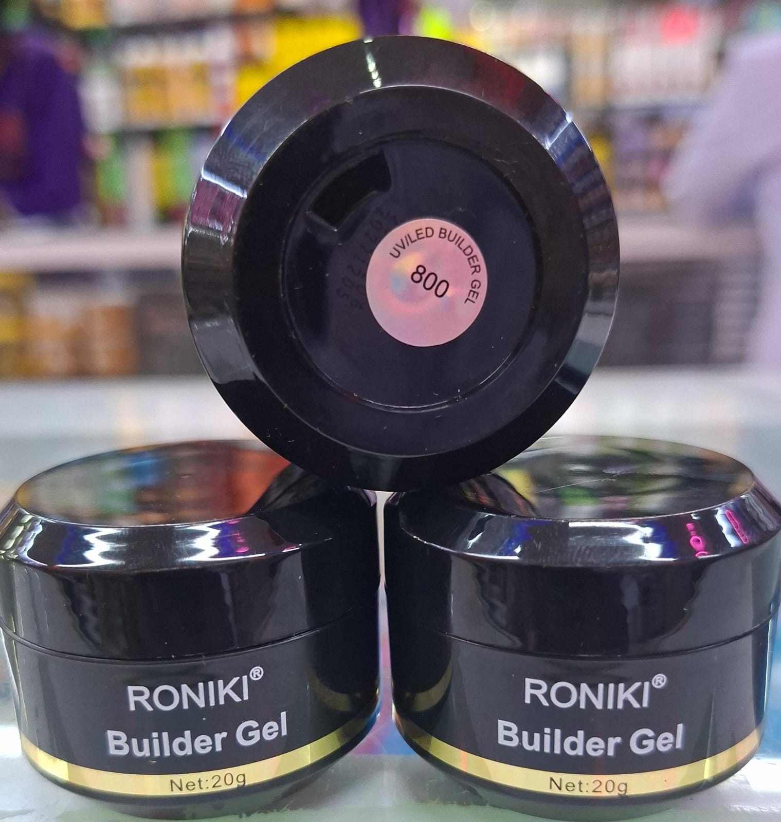 Roniki builder gel 20g It is a professional-grade hard gel designed for nail extensions,overlays,and strengthening natural nails.The gel typically has a medium consistency that allows to spread easily
