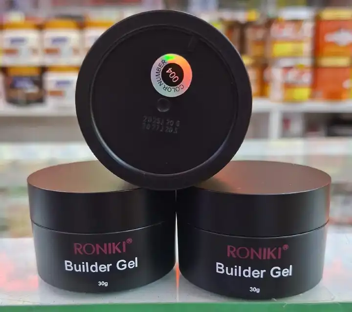 RONIKI Builder Gel, a self-shaping, hard gel used for artificial nail applications and strengthening natural nails. It is commonly used in professional nail salons or for at-home manicures .