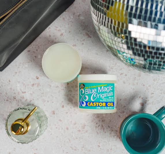 Blue Magic Originals Castor Oil, a deep-conditioning hair and scalp treatment. It is formulated to provide maximum strength hydration, particularly for natural, textured, or dry hair styles.