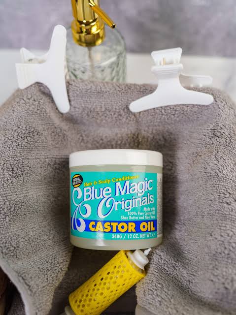 Blue Magic Originals Castor Oil, a deep-conditioning hair and scalp treatment. It is formulated to provide maximum strength hydration, particularly for natural, textured, or dry hair styles.