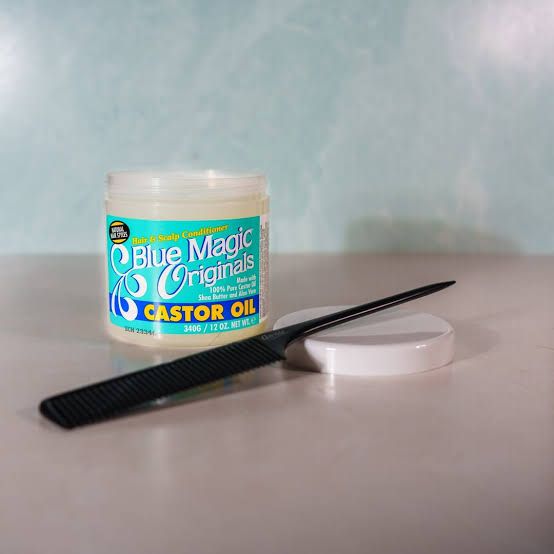 Blue Magic Originals Castor Oil, a deep-conditioning hair and scalp treatment. It is formulated to provide maximum strength hydration, particularly for natural, textured, or dry hair styles.