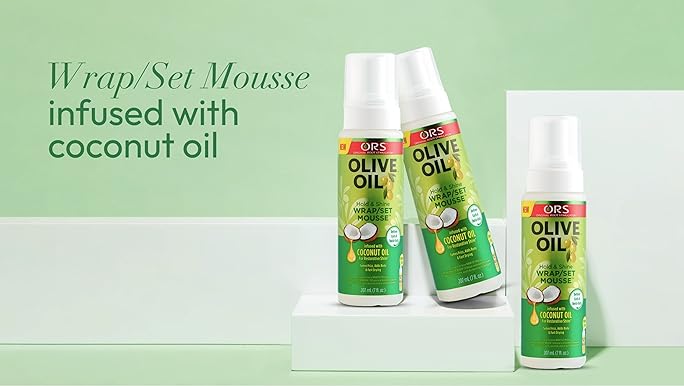 Olive Oil Ors Olive Oil Hold & Shine Wrap/Set Mousse - 207ml combines the power of nourishing Olive Oil and restorative Coconut Oil to moisturize and enhance shine while delivering incredible hold.
