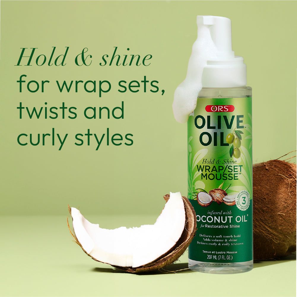 Olive Oil Ors Olive Oil Hold & Shine Wrap/Set Mousse - 207ml combines the power of nourishing Olive Oil and restorative Coconut Oil to moisturize and enhance shine while delivering incredible hold.