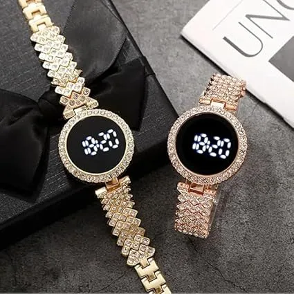 Ladies LED Watch paired with coordinating stackable bracelets.a watch comes as  set with multiple stackable bracelets, often including heart shaped charms or leaf motifs gold-tone watch with a crystal
