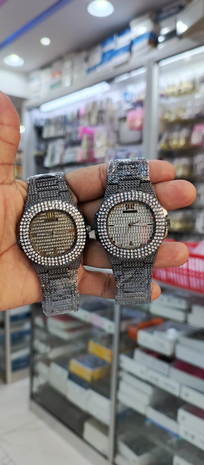 Sekou Ice watch brand new ice .Full rhinestone or crystal coverage on the dial and metal chain strap as unisex, often styled with an oblong case and protective "ear" designs around the crown.