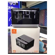 Kisonli G8 Bluetooth Alarm Clock Speaker. It includes an alarm clock, LCD display, hands-free calling via built-in microphone, FM radio, and supports USB, TF/SD card, and AUX inputs.