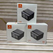 Kisonli G8 Bluetooth Alarm Clock Speaker. It includes an alarm clock, LCD display, hands-free calling via built-in microphone, FM radio, and supports USB, TF/SD card, and AUX inputs.