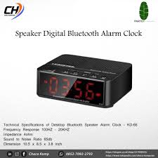 Kisonli G8 Bluetooth Alarm Clock Speaker. It includes an alarm clock, LCD display, hands-free calling via built-in microphone, FM radio, and supports USB, TF/SD card, and AUX inputs.