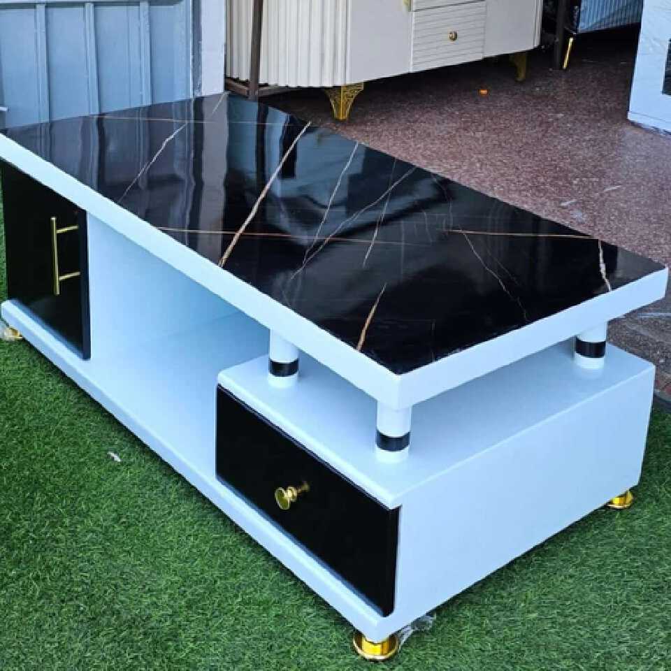 New design coffee table with brown or black top size 4x2  for your living room.