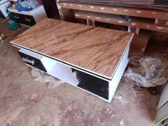New design coffee table with brown or black top size 4x2  for your living room.