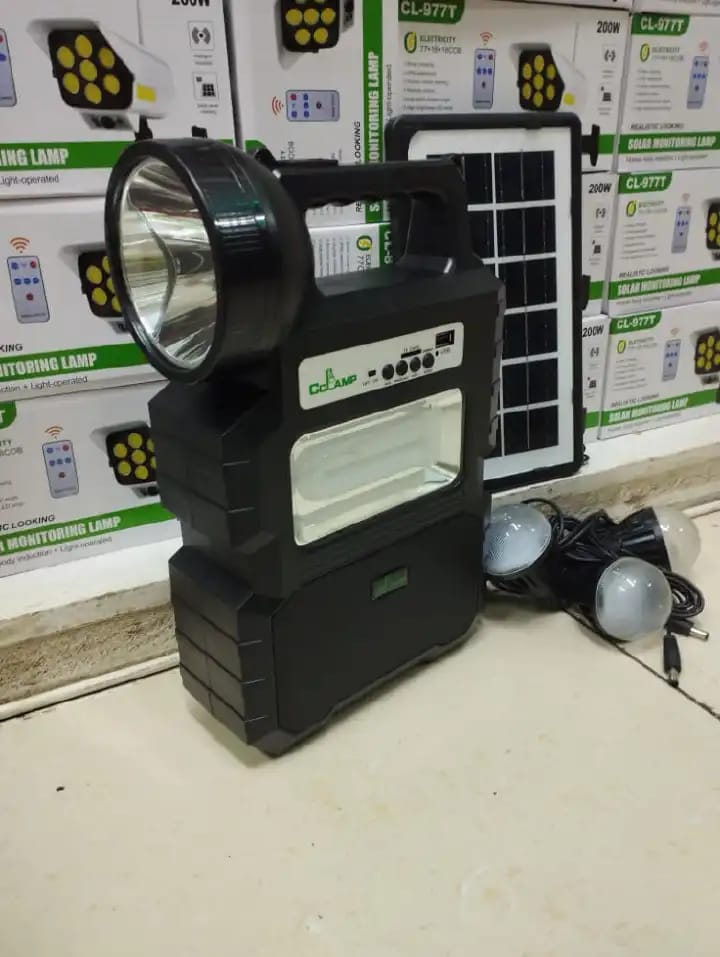 TRUSTED SOURCE Dat 9015B SOLAR SYSTEM LIGHT full KIT Has a Bluetooth Radio A Solar Panel 3 bulbs 2 torches A Lantern Lamp An Adapter and phone chargers