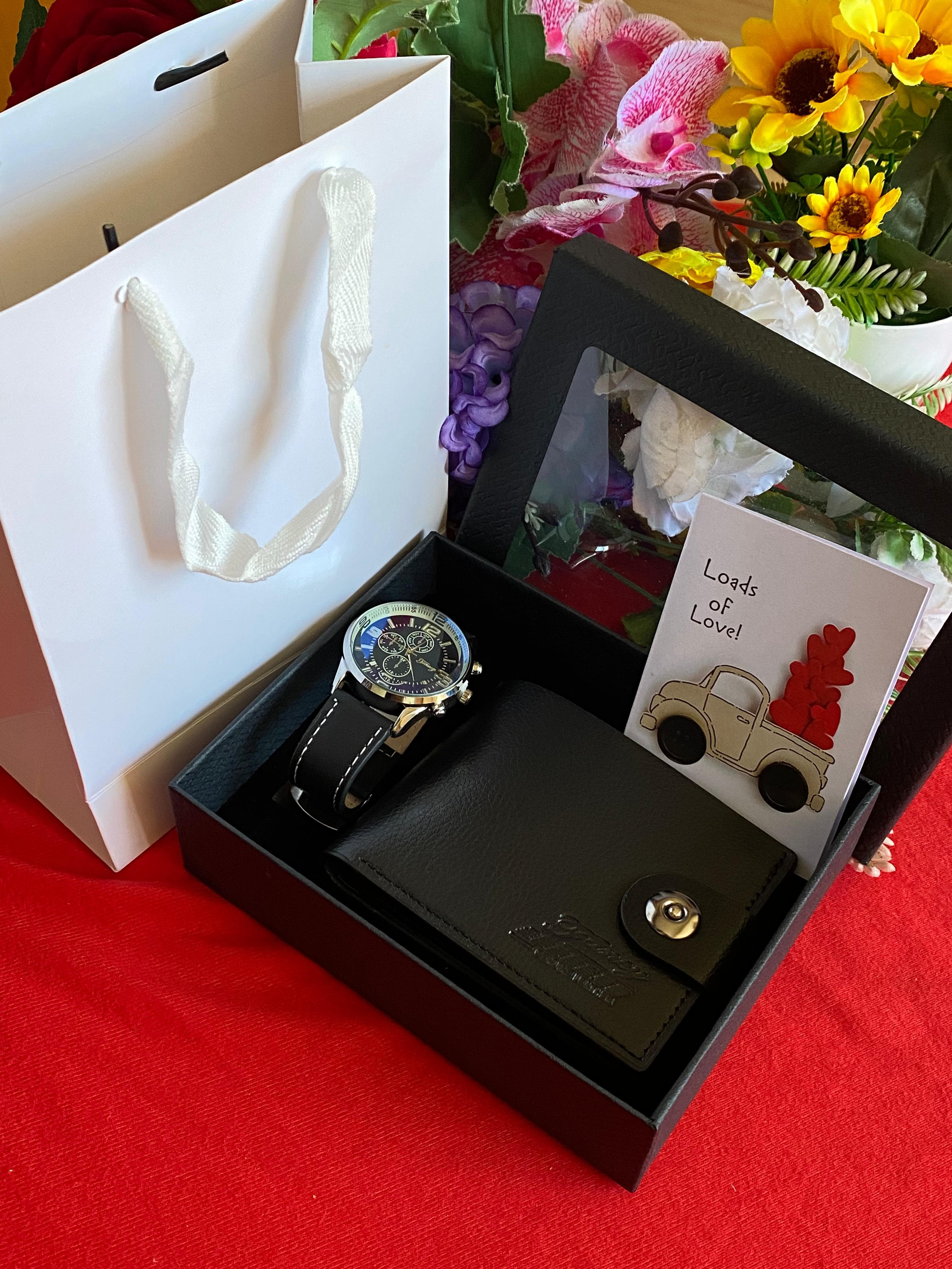 (NEW CLASSY ARRIVAL)Mens modest valentines gift set.Comprises of a watch a card a bag and a wallet.