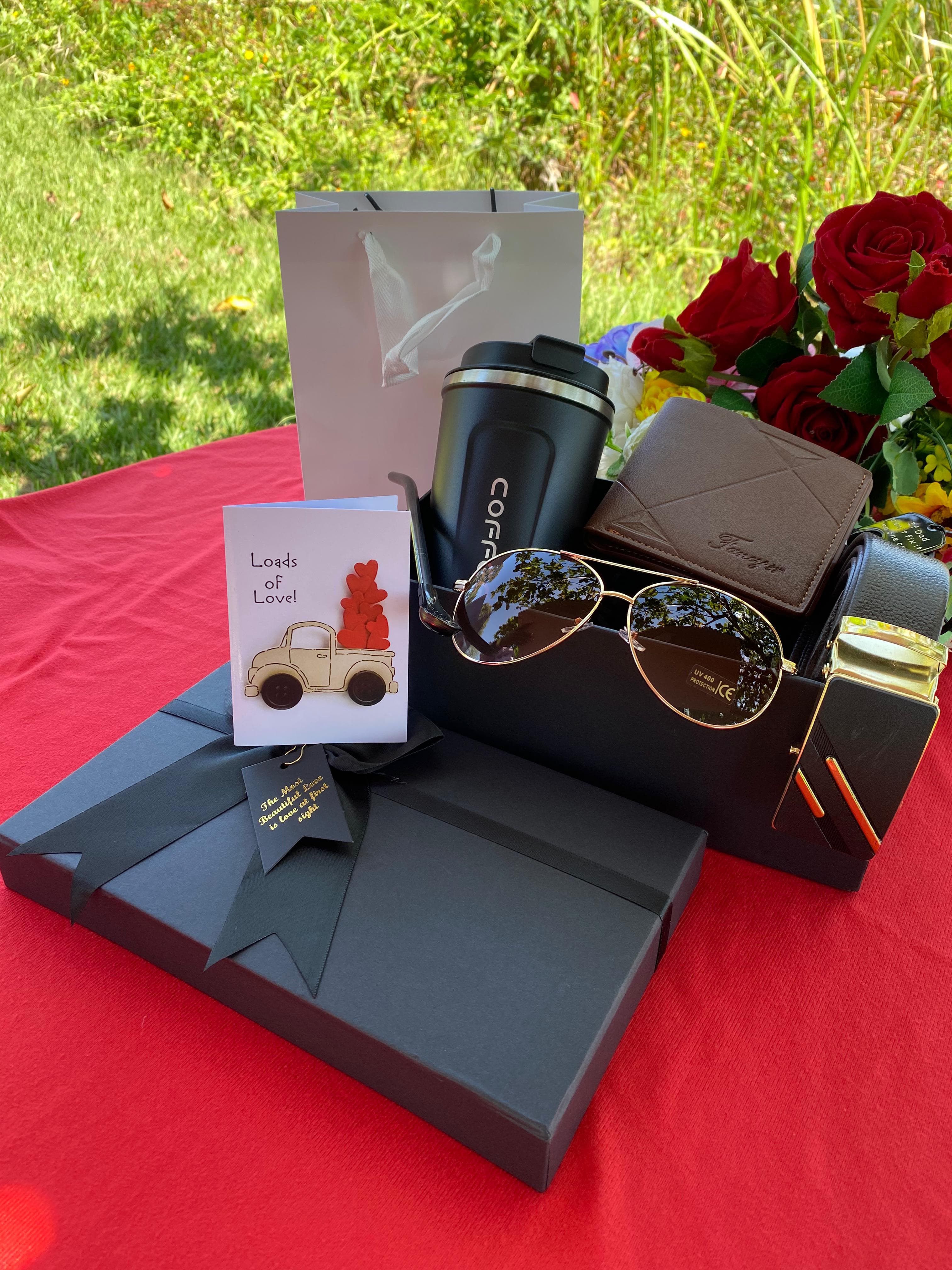 (EXPRESS LOVE DEMURELY)VALENTINES MEN GIFT PACK 
 Thermal coffee cup/mug  Scooping/Stirring spoon Sunglasses  Bottle opener/Key holder Wallet  Belt Gift card  Box & Bag